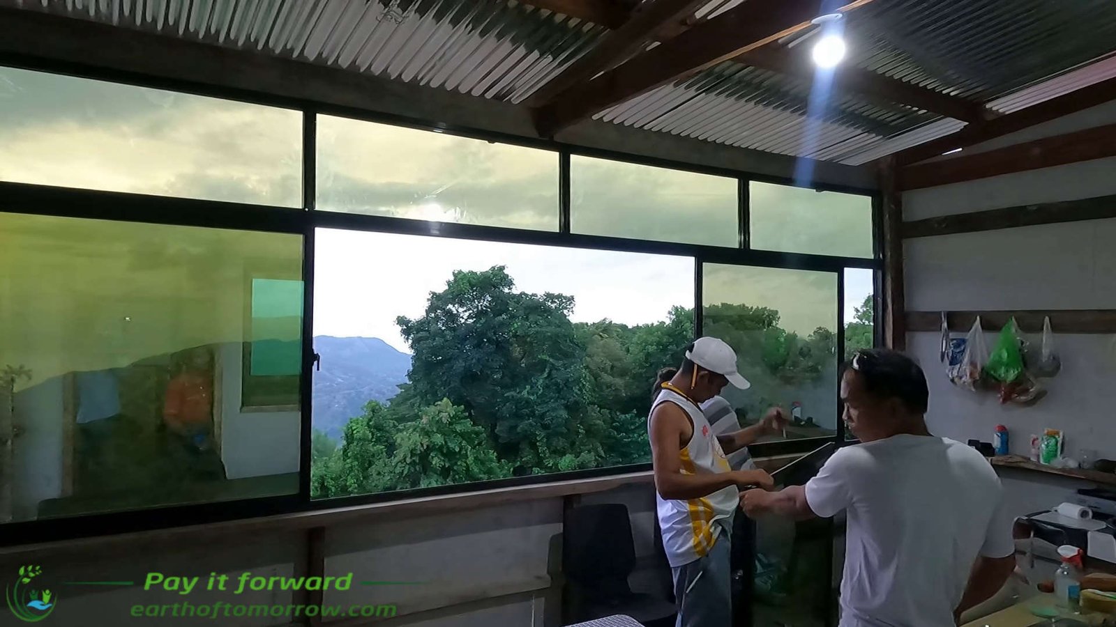 Installing windows in our Ginatilan mountain home